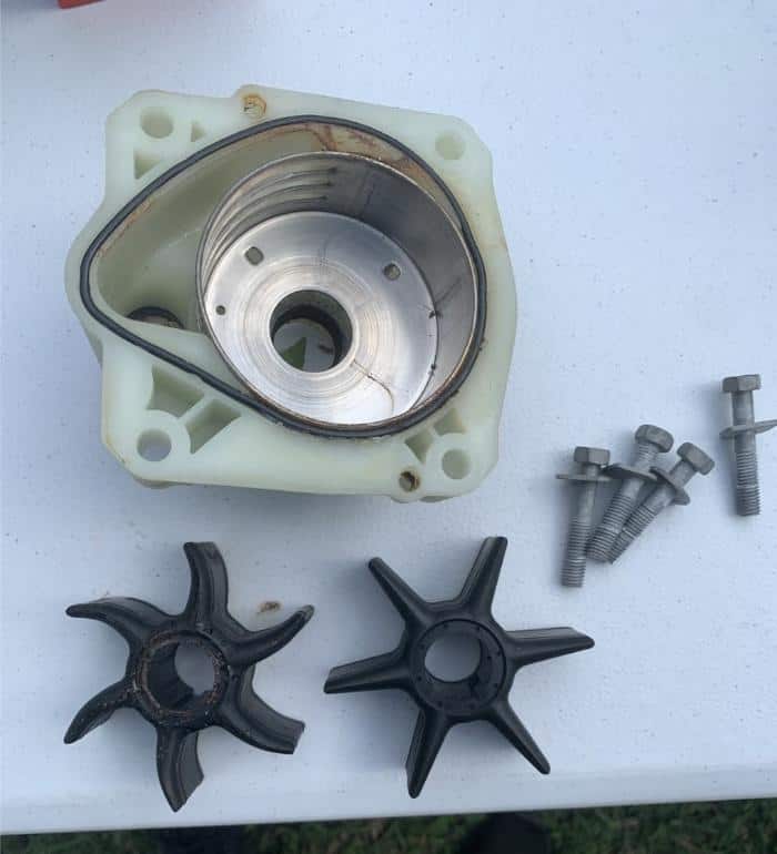 Worn water pump impeller removed from an outboard lower unit